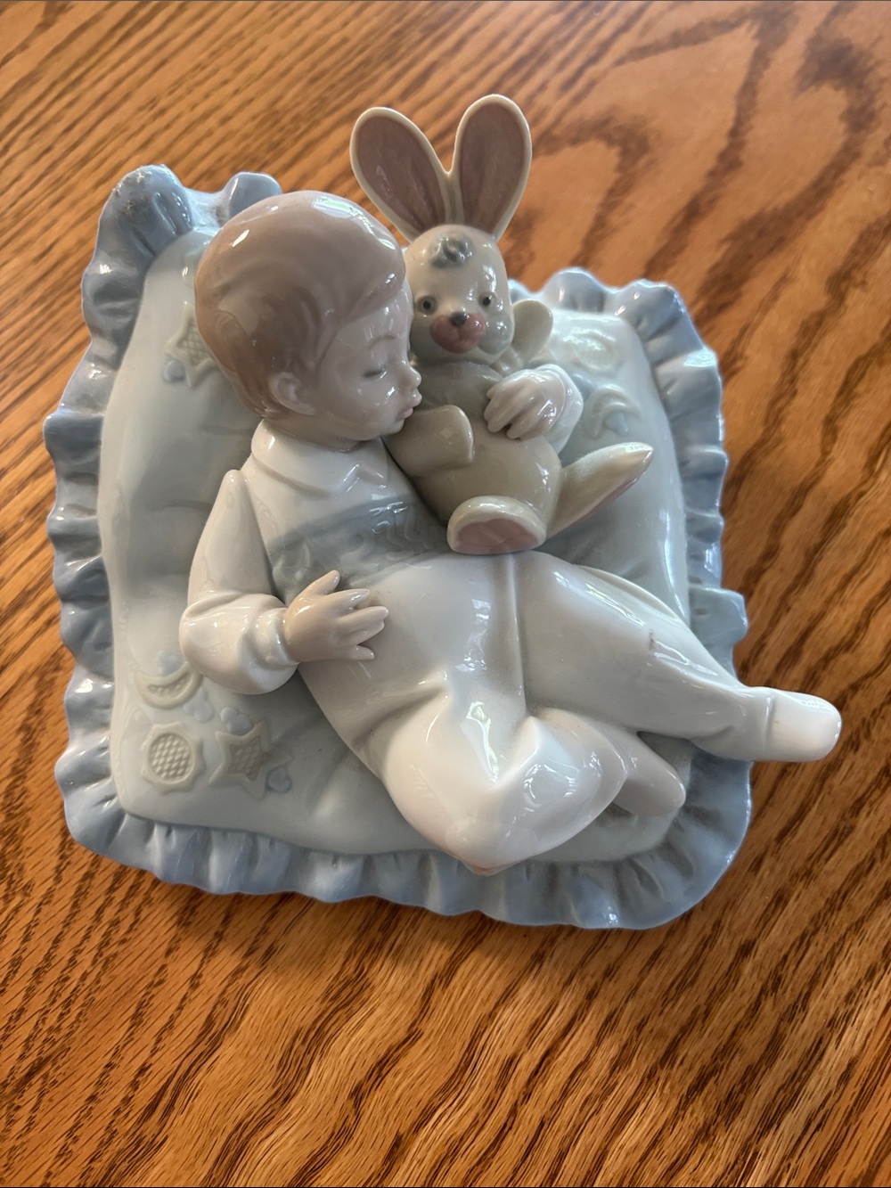 Porcelain Boy Figurine on Blue Pillow with Bunny - Light Blue and Cream
